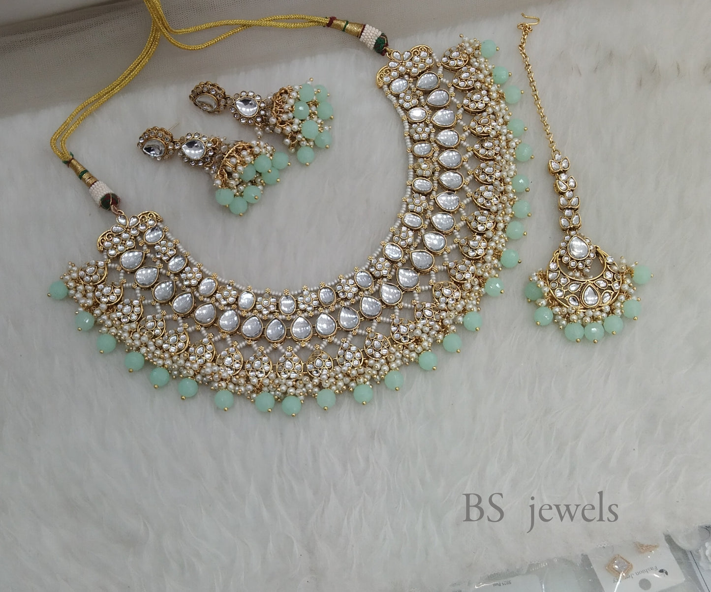 Raagavi Pista Kundan Jewelry Set