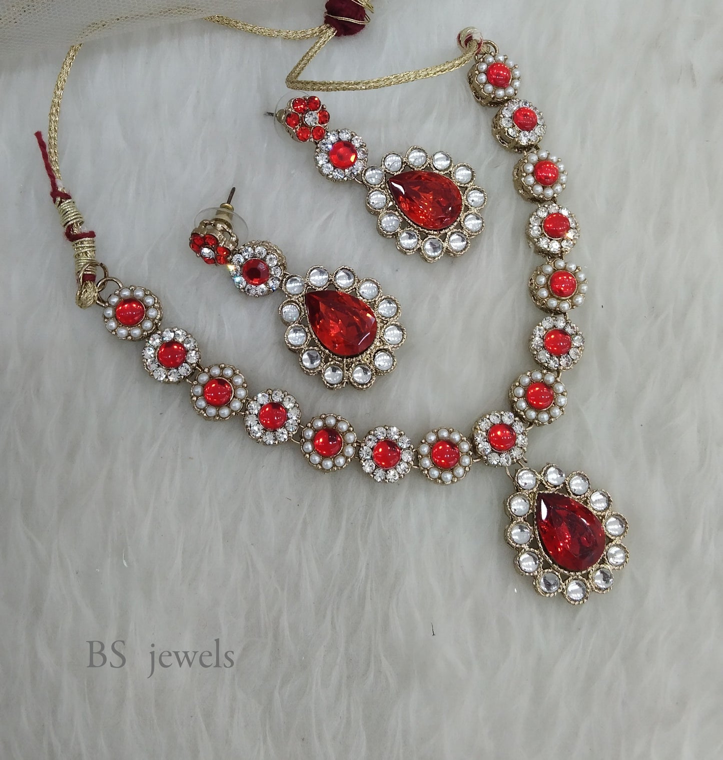 Raahi Red Kundan Jewelry Set