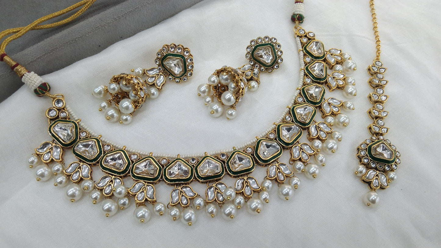 Anita Gold white Kundan Jewelry Set